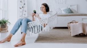 woman relaxing usung the phone